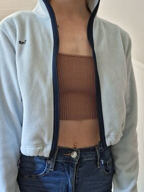 TNA Light Blue Fleece Jacket with Black Trim